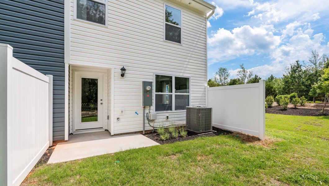 Front exterior of a new home in Tanglewood Townes, Greenville, SC, highlighting curb appeal (Image 2).