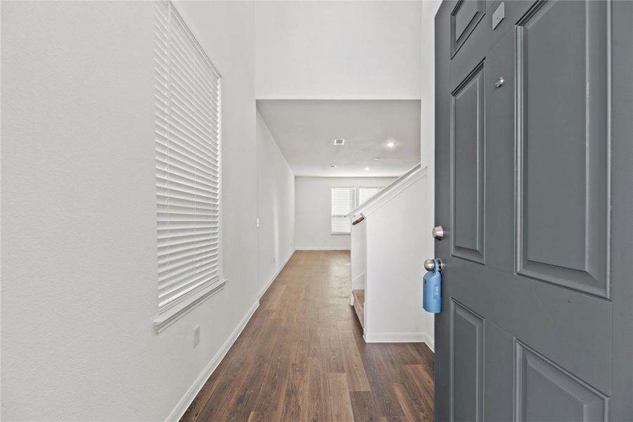 Front entry with vinyl plank flooring. Front entry with vinyl plank flooring.