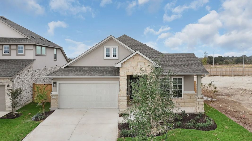 Representative exterior photo of a completed home built from the Lucas by Chesmar Homes in Santa Rita Ranch, Liberty Hill, TX (Image 1). Representative exterior photo of a completed home built from the Lucas by Chesmar Homes in Santa Rita Ranch, Liberty Hill, TX (Image 1).