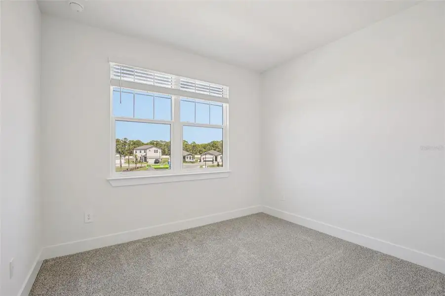 Spacious, unfurnished interior of a new home in Magnolia Bay - Reserve Series, Nokomis (Image 24).