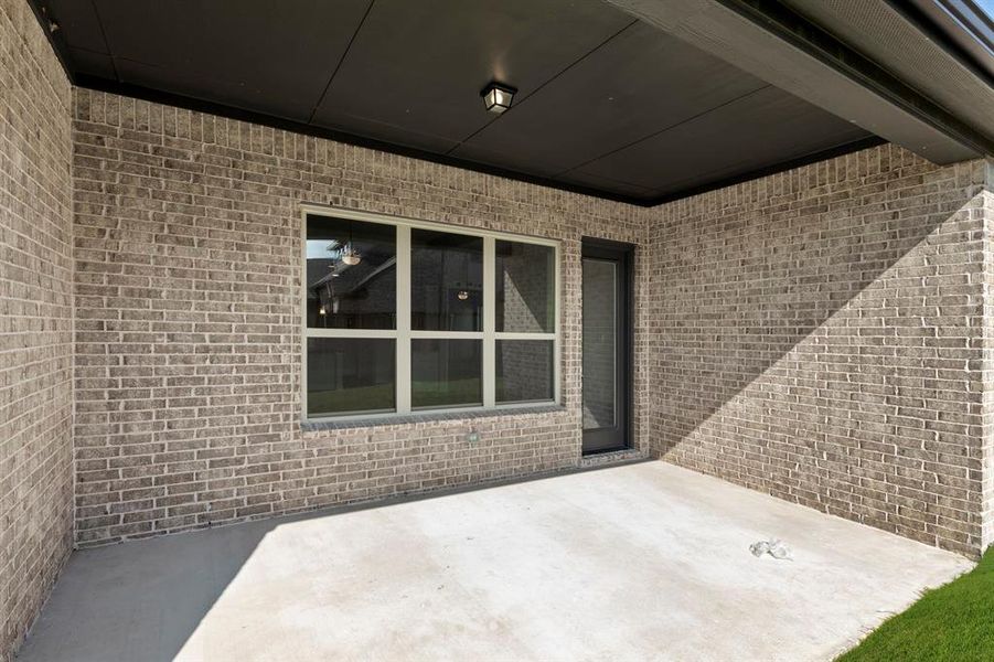 Exterior details and patio area of a home in River Ranch, Van Alstyne (Image 3). Exterior details and patio area of a home in River Ranch, Van Alstyne (Image 3).