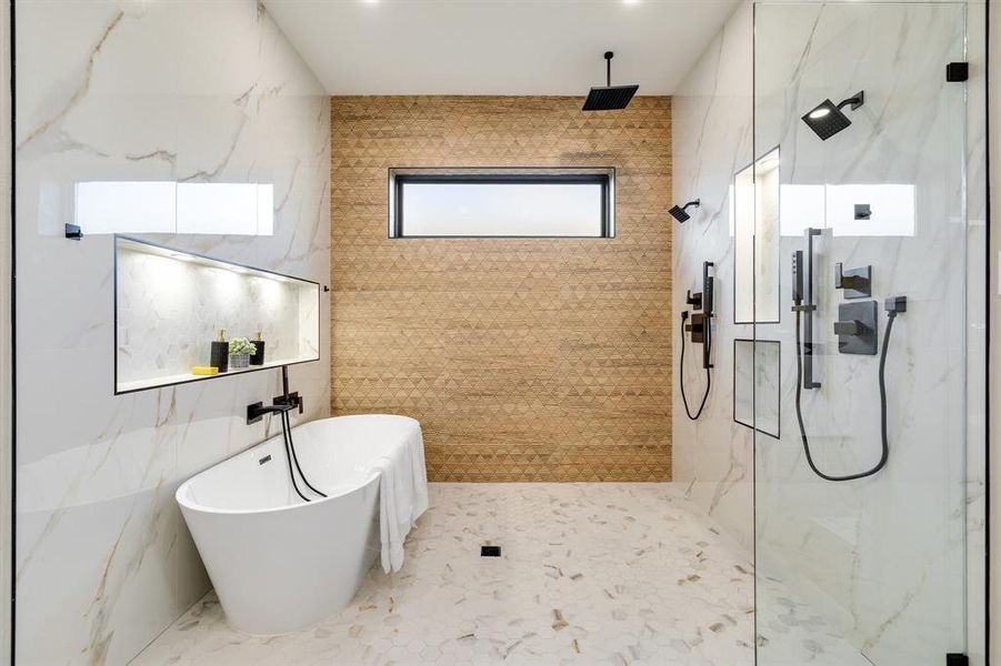 Bathroom with separate shower and tub and tile walls