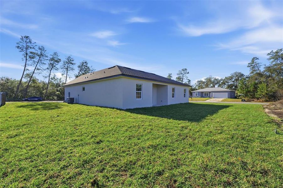 Exterior details and patio area of a home in , Ocala (Image 3).