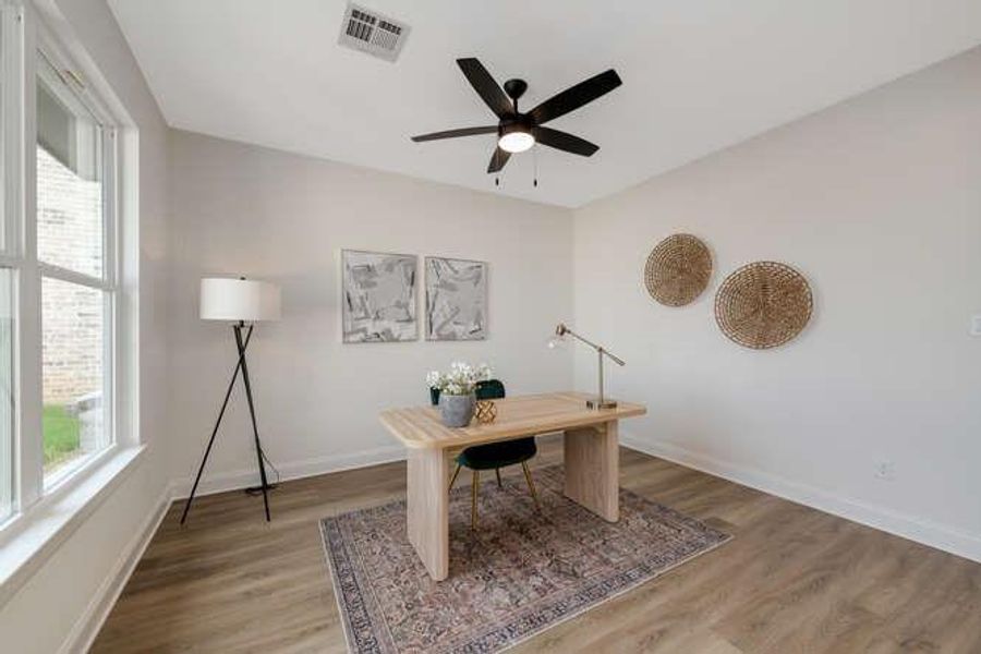 Office featuring light wood-style floors and ceiling fan Office featuring light wood-style floors and ceiling fan
