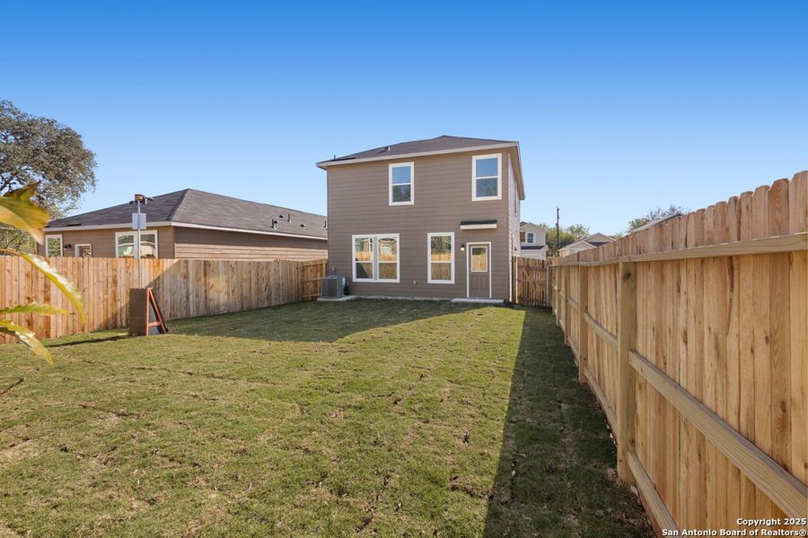 Exterior details and patio area of a home in Spanish Trails Villas, San Antonio (Image 3).