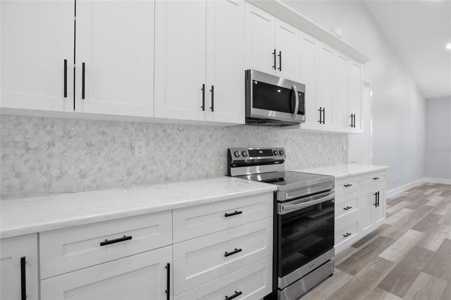 Furnished interior view inside a new home in , Port Charlotte (Image 12).