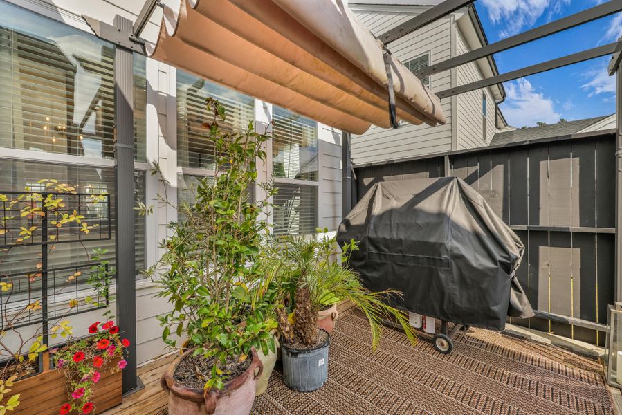 Exterior details and patio area of a home in Homecoming, Ravenel (Image 23). Exterior details and patio area of a home in Homecoming, Ravenel (Image 23).