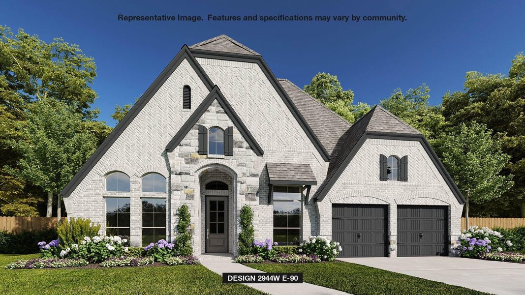 French provincial home with a garage and a front lawn