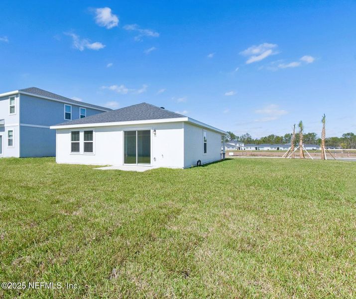 Exterior details and patio area of a home in Flagler Village - Classic Series, Palm Coast (Image 25).