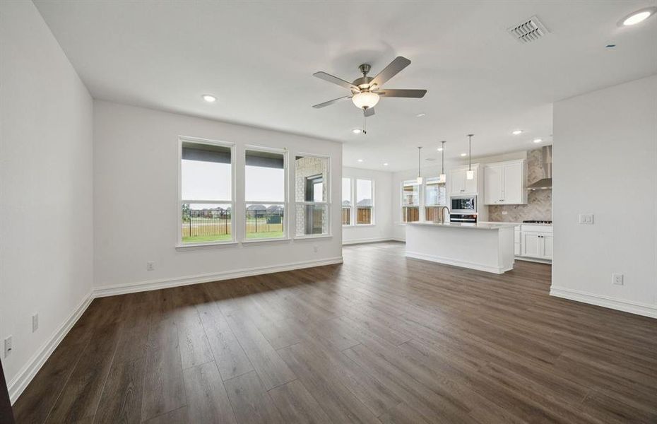 Gathering room drenched in natural light, creating a warm atmosphere *Real home pictured Gathering room drenched in natural light, creating a warm atmosphere *Real home pictured