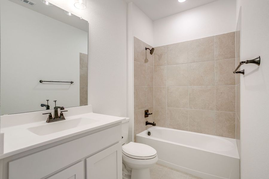 Representative furnished interior of a home built from the Valera by Graham Hart Home Builder in Bear Ridge, Burleson (Image 6).
