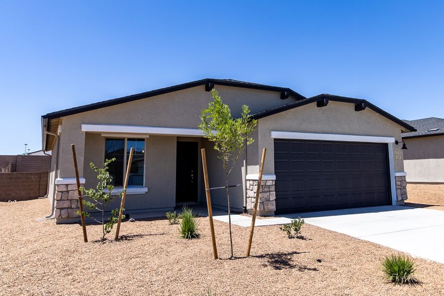Front exterior of a new home in Perkinsville, Chino Valley, AZ, highlighting curb appeal (Image 17). Front exterior of a new home in Perkinsville, Chino Valley, AZ, highlighting curb appeal (Image 17).