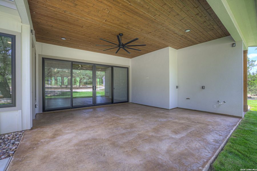 Exterior details and patio area of a home in , Spring Branch (Image 4). Exterior details and patio area of a home in , Spring Branch (Image 4).