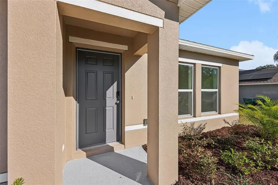 Exterior details and patio area of a home in Deltona Classic, Deltona (Image 4). Exterior details and patio area of a home in Deltona Classic, Deltona (Image 4).