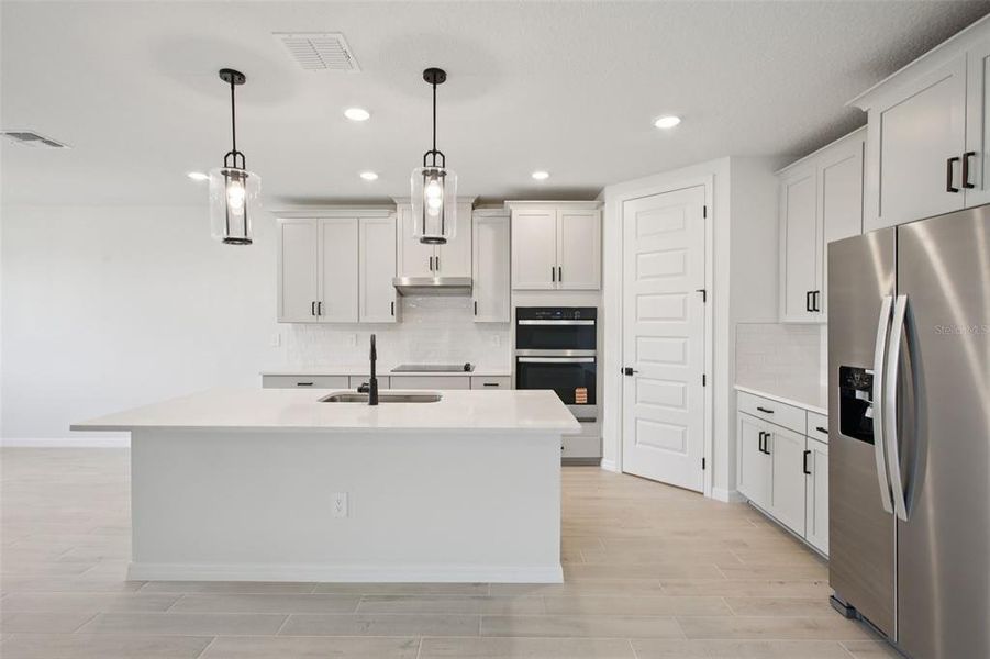 Furnished interior view inside a new home in Two Rivers - Signature Series, Zephyrhills (Image 10).