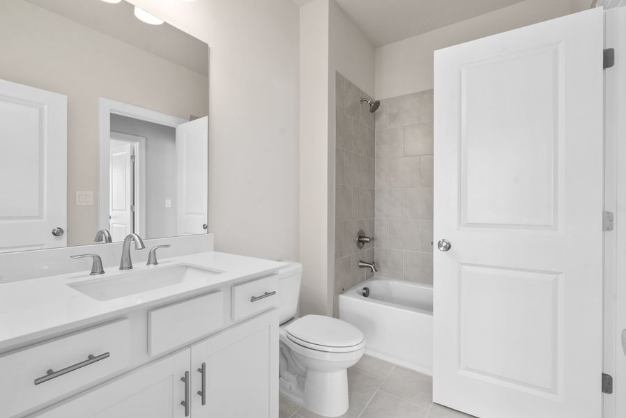Representative furnished interior of a home built from the The Caplin by The Providence Group in Aberdeen, Hoschton (Image 9).