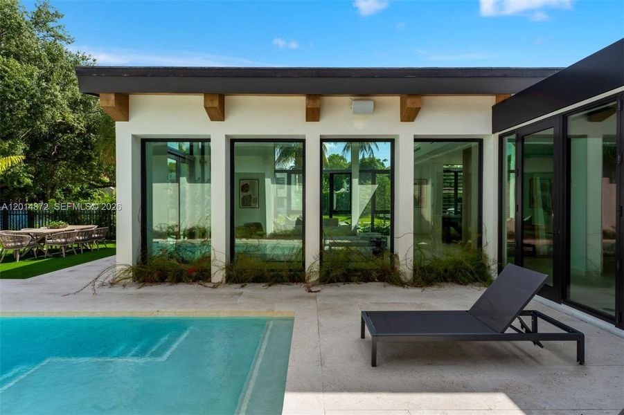 Exterior details and patio area of a home in , Coral Gables (Image 19). Exterior details and patio area of a home in , Coral Gables (Image 19).