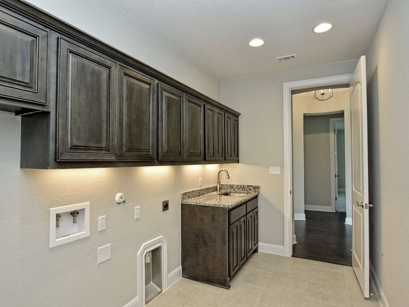 Representative furnished interior of a home built from the Madera II by Giddens Homes in Scofield Farms Estates, Georgetown (Image 197).