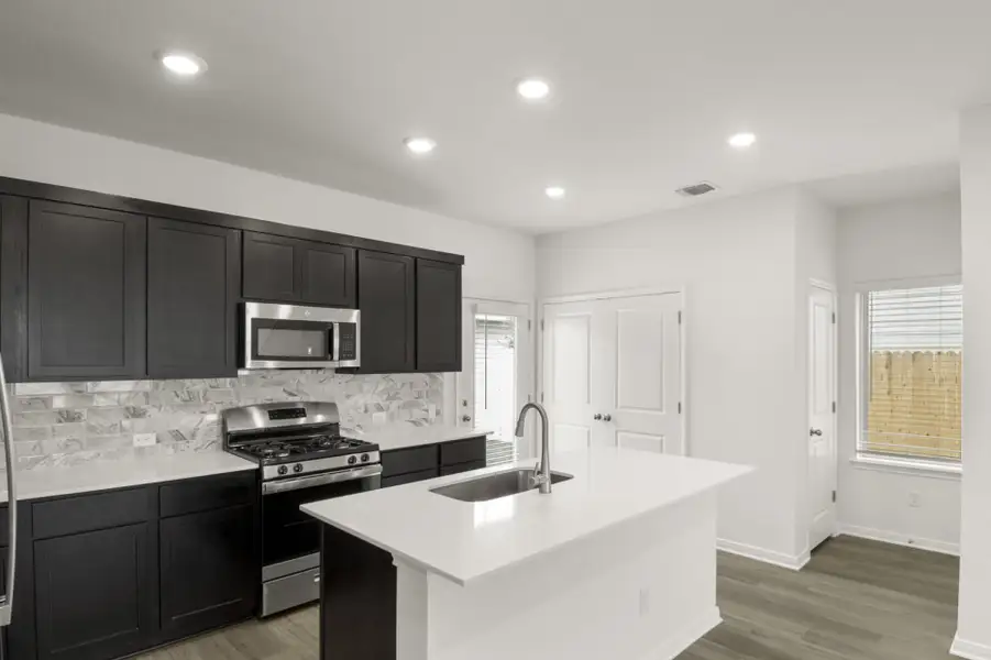 Furnished interior view inside a new home in Trace, San Marcos (Image 6).