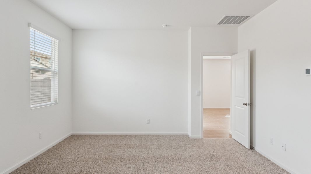 Spacious, unfurnished interior of a new home in Copper Falls, Buckeye (Image 16). Spacious, unfurnished interior of a new home in Copper Falls, Buckeye (Image 16).