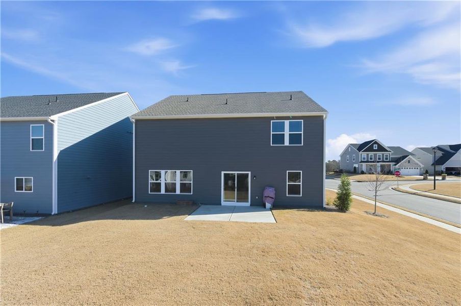 Exterior details and patio area of a home in Twin Lakes, Hoschton (Image 4).
