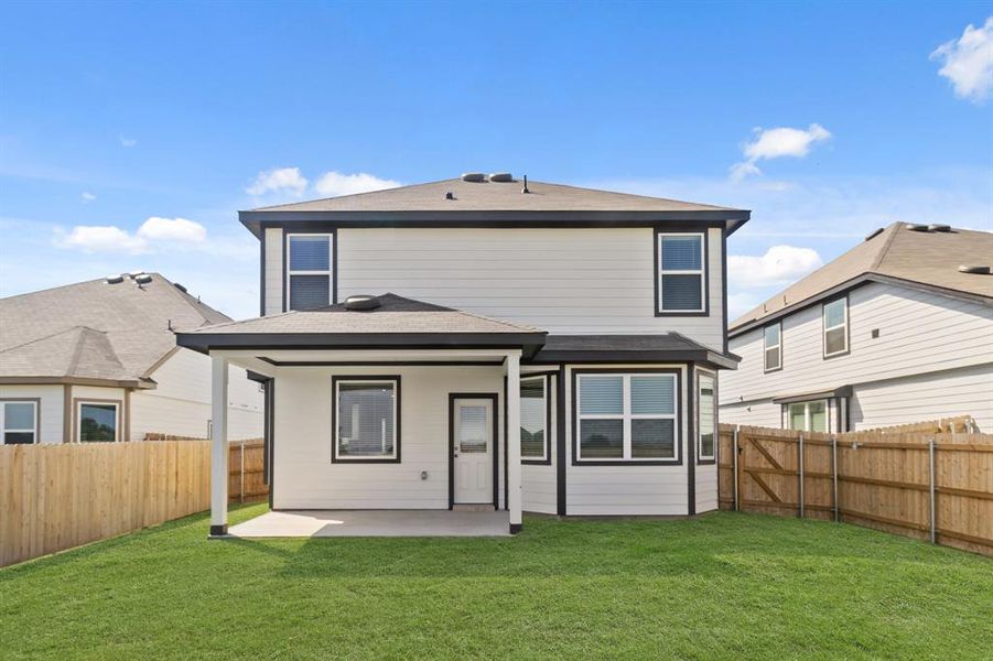 Exterior details and patio area of a home in Retreat at Fossil Creek, Fort Worth (Image 2).