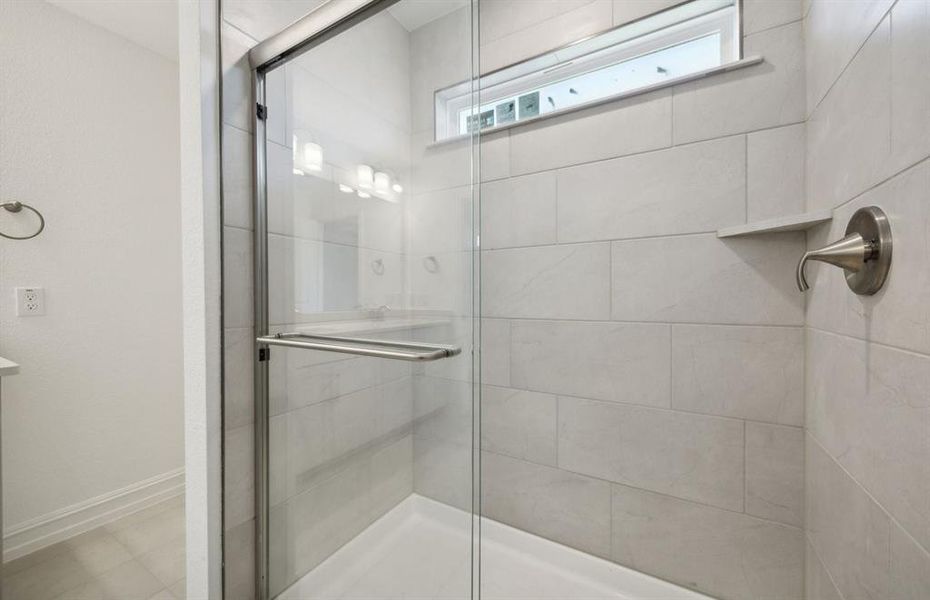 Owner's bath with oversized shower*real home pictured