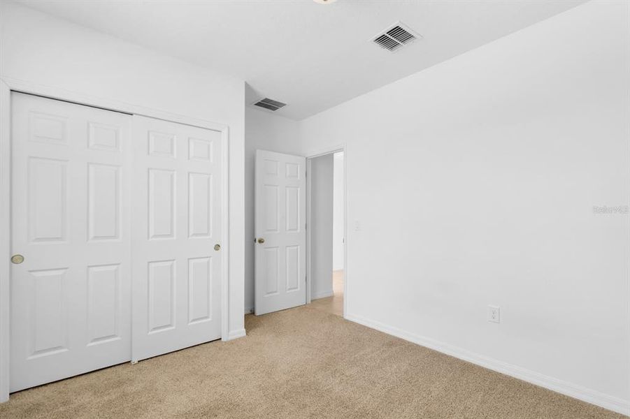 Spacious, unfurnished interior of a new home in Lawson Dunes - Signature Series, Haines City (Image 25).