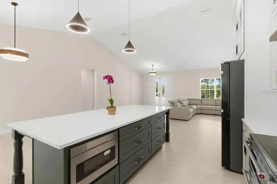 Furnished interior view inside a new home in , Dunnellon (Image 7).