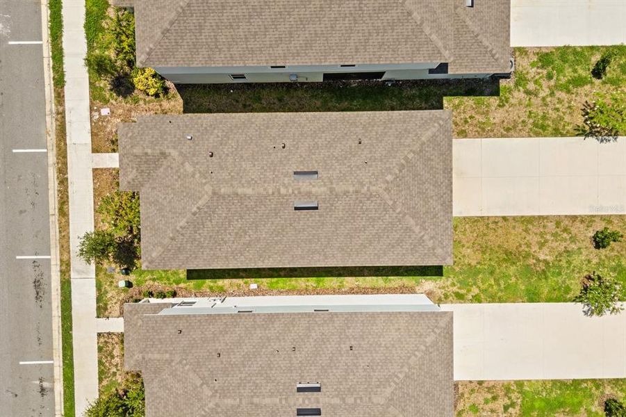 Front exterior of a new home in , Apopka, FL, highlighting curb appeal (Image 13).