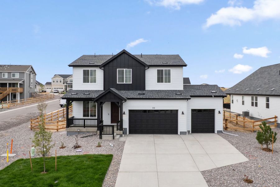 Front exterior of a new home in Independence, Elizabeth, CO, highlighting curb appeal (Image 30).