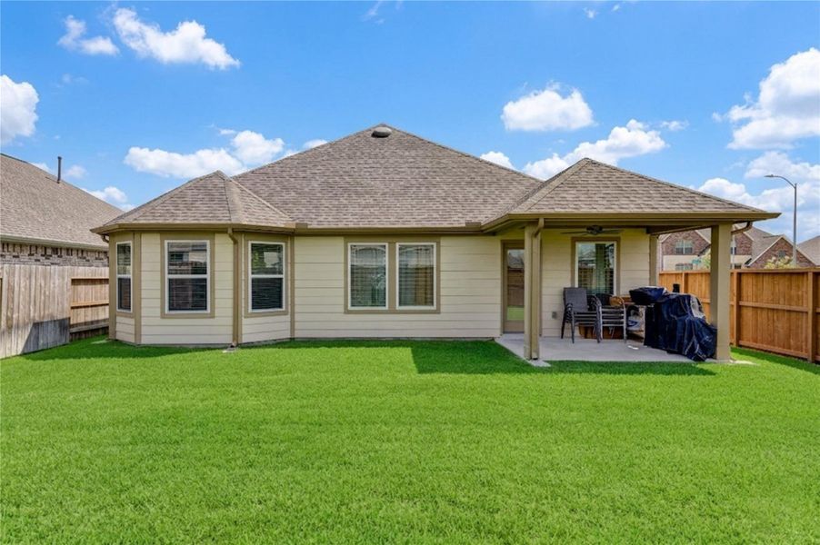 Exterior details and patio area of a home in Marvida, Cypress (Image 22).