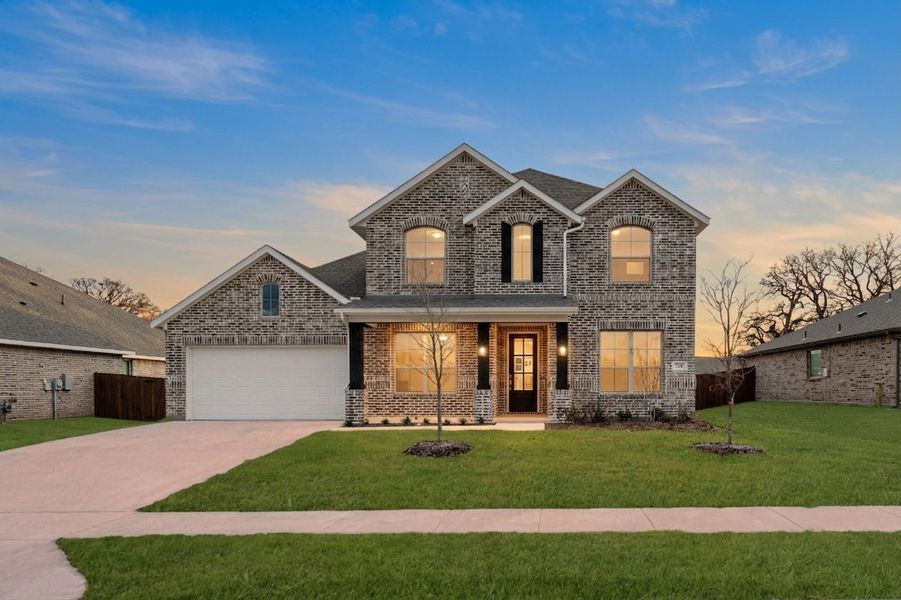 Representative exterior photo of a completed home built from the Willow by Kindred Homes in Dominion Park, Waxahachie, TX (Image 42).
