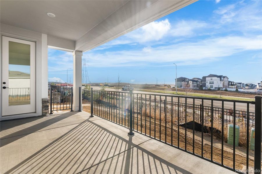 Exterior details and patio area of a home in Harvest Crossing, Aurora (Image 3).