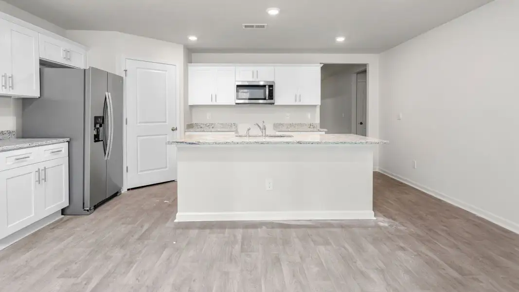 Furnished interior view inside a new home in Madison Gardens, Lexington (Image 5).