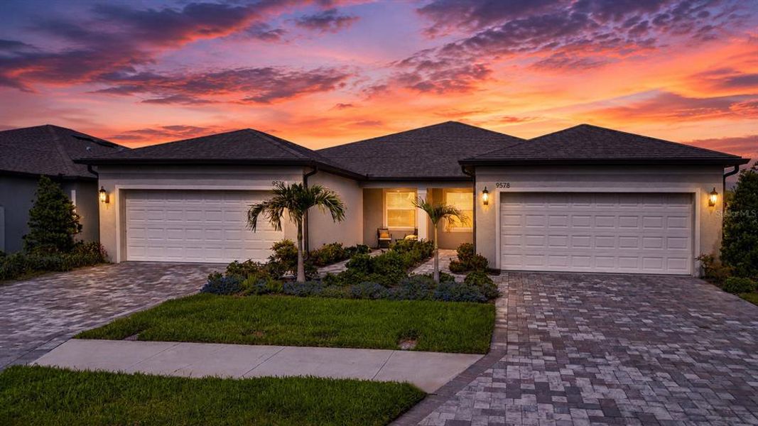 Front exterior of a new home in , Parrish, FL, highlighting curb appeal (Image 1). Front exterior of a new home in , Parrish, FL, highlighting curb appeal (Image 1).