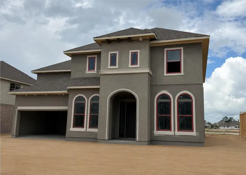 Front exterior of a new home in The Meadows at Imperial Oaks, Spring, TX, highlighting curb appeal (Image 1). Front exterior of a new home in The Meadows at Imperial Oaks, Spring, TX, highlighting curb appeal (Image 1).