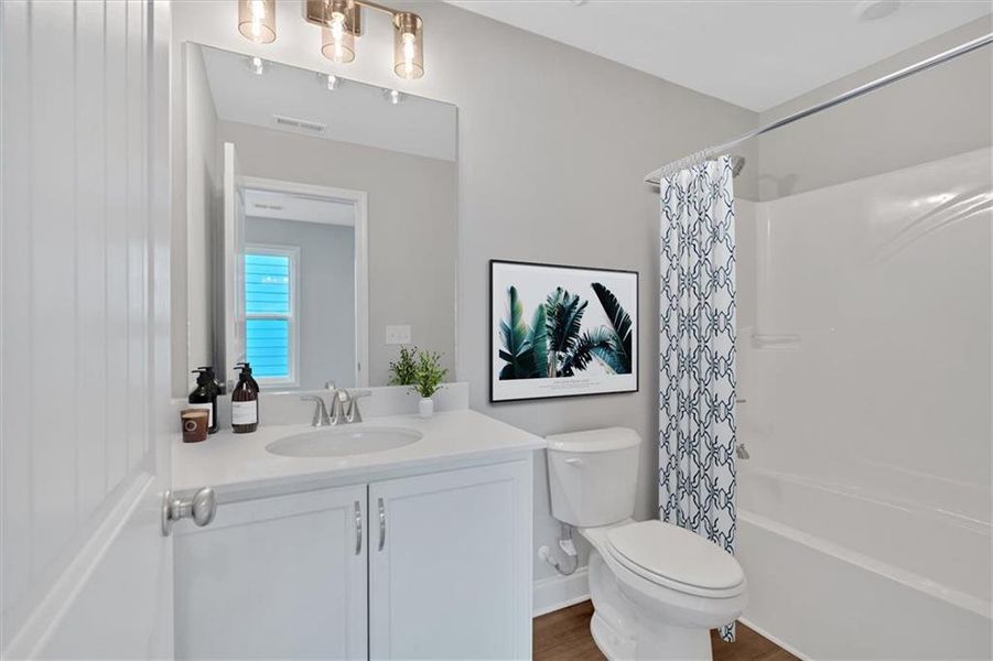 Furnished interior view inside a new home in Heritage Pointe at The Georgian, Villa Rica (Image 18).