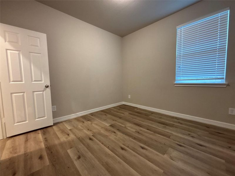 Spacious, unfurnished interior of a new home in Sunterra, Katy (Image 20).