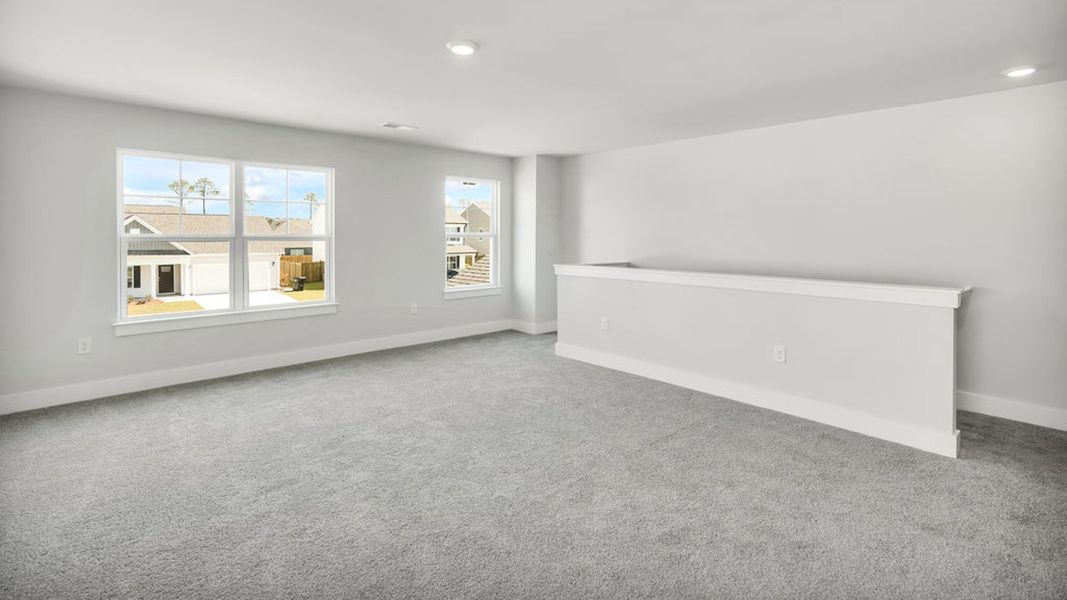 Spacious, unfurnished interior of a new home in Sidbury Station, Castle Hayne (Image 28).