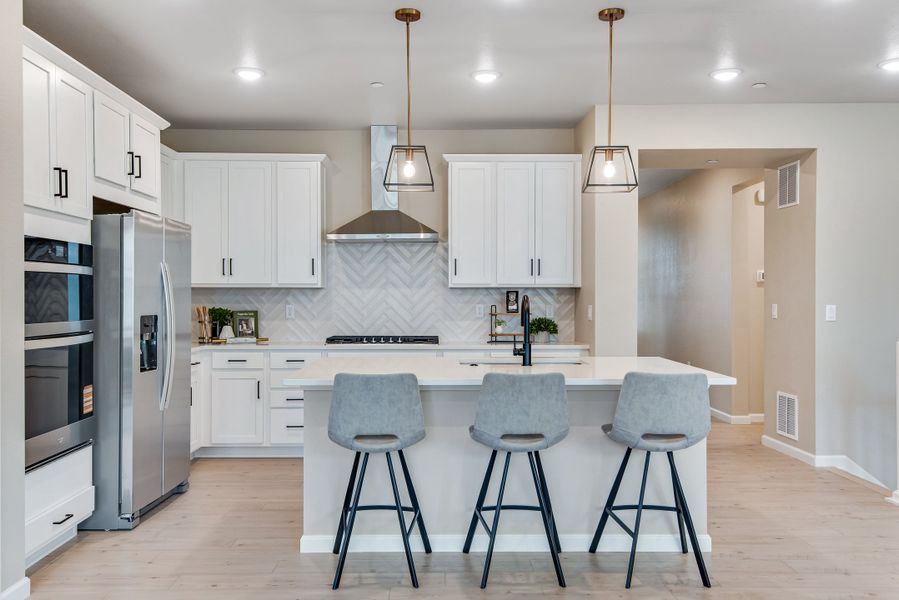 Furnished interior view inside a new home in Reunion, Commerce City (Image 11).