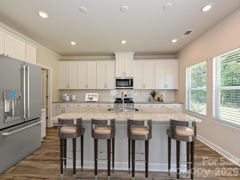 Photo is not of the actual home, but is an inspirational photo of builder’s model home and may depict options, furnishings, and/or decorator features that are not included