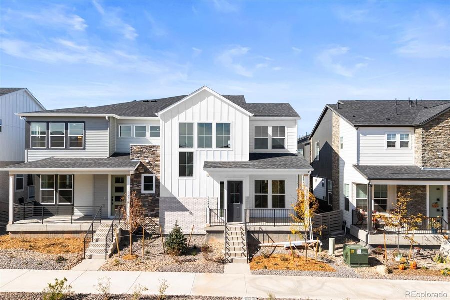 Front exterior of a new home in Duet at Sterling Ranch, Littleton, CO, highlighting curb appeal (Image 2).