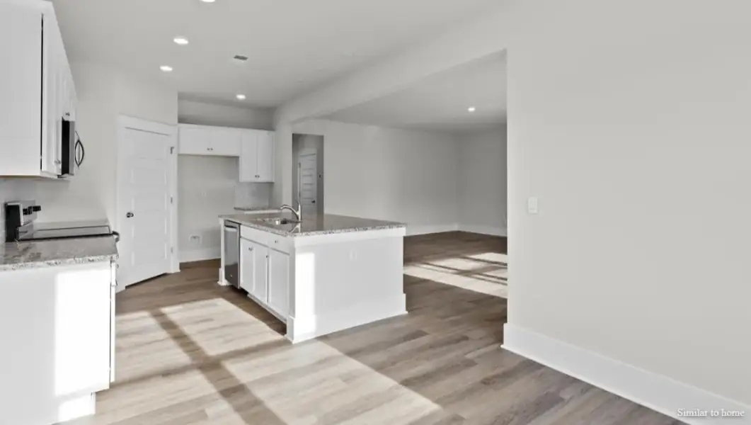 Furnished interior view inside a new home in The Highlands at Cedar Hill Landing, Navassa (Image 10).