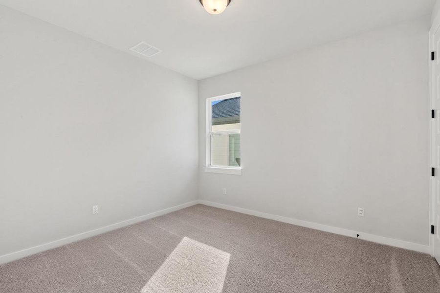 Spacious, unfurnished interior of a new home in Heritage, Dripping Springs (Image 19).
