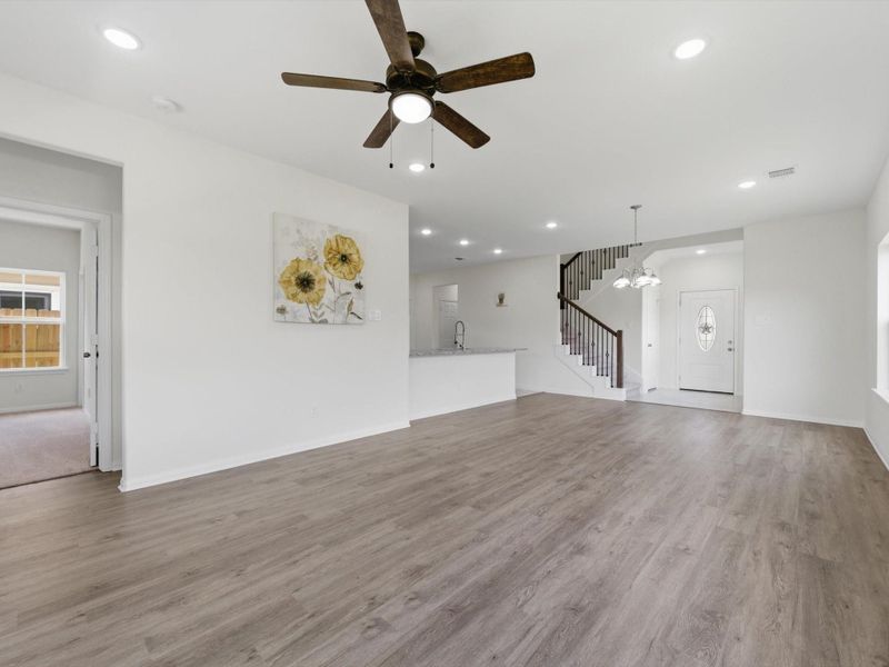 The spacious living room is designed for modern living, with soaring ceilings and an open-concept layout that keeps everyone connected. The spacious living room is designed for modern living, with soaring ceilings and an open-concept layout that keeps everyone connected.