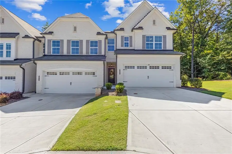 Front exterior of a new home in , Duluth, GA, highlighting curb appeal (Image 27). Front exterior of a new home in , Duluth, GA, highlighting curb appeal (Image 27).