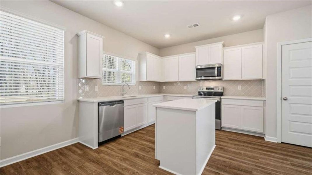 Furnished interior view inside a new home in Oakchase at Hampton, Hampton (Image 3).