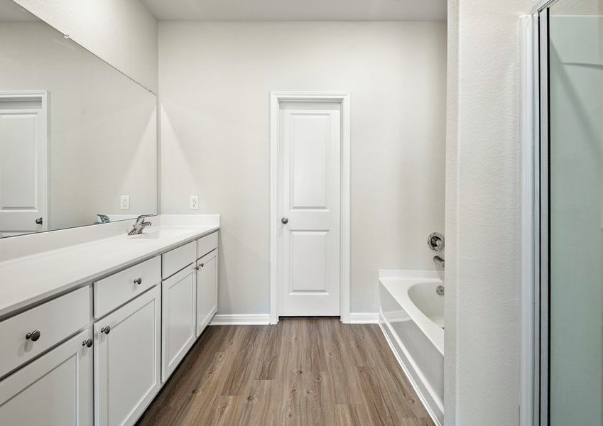 A large vanity in the master bathroom