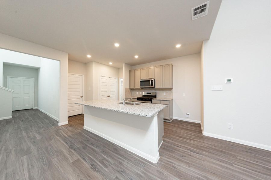 Furnished interior view inside a new home in River's Edge, Conroe (Image 6).